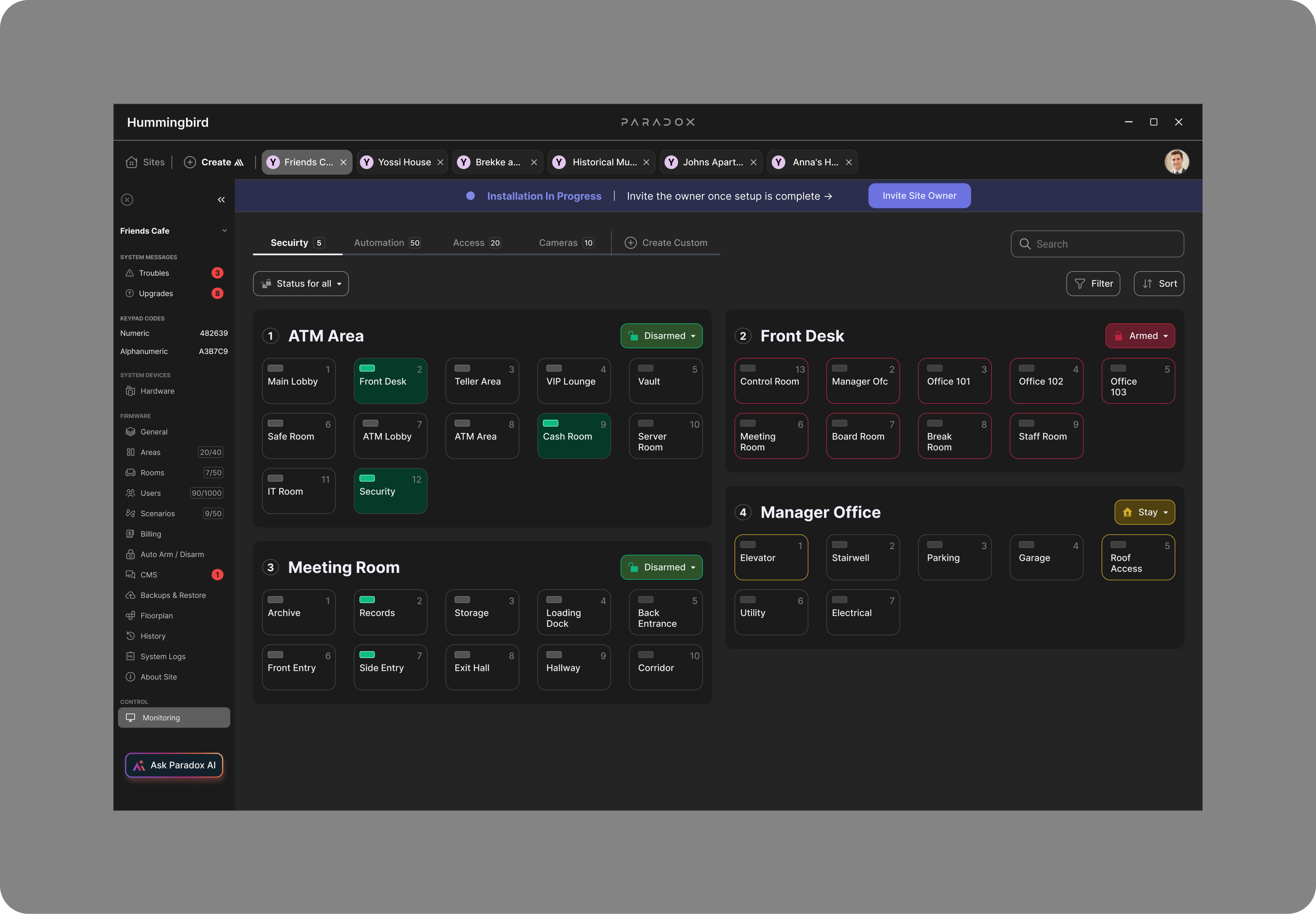 Monitoring screen, Security tab — security areas (ATM Area, Front Desk, Meeting Room, Manager Office) each shown as a card of grouped zones with per-area Armed, Disarmed and Stay states