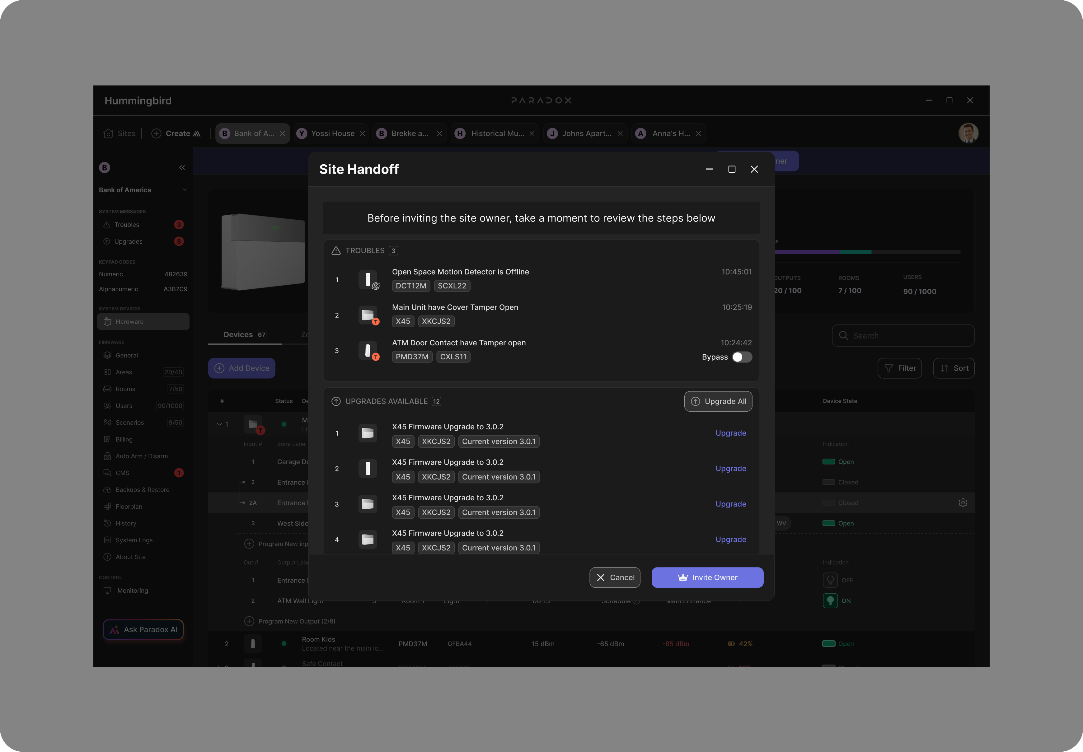 Site Handoff modal over the hardware workspace — heading 'Before inviting the site owner, take a moment to review the steps below', with a Troubles list (offline detector and tamper-open items, one with a Bypass toggle), an Upgrades Available list with an Upgrade All action, and Cancel / Invite Owner buttons